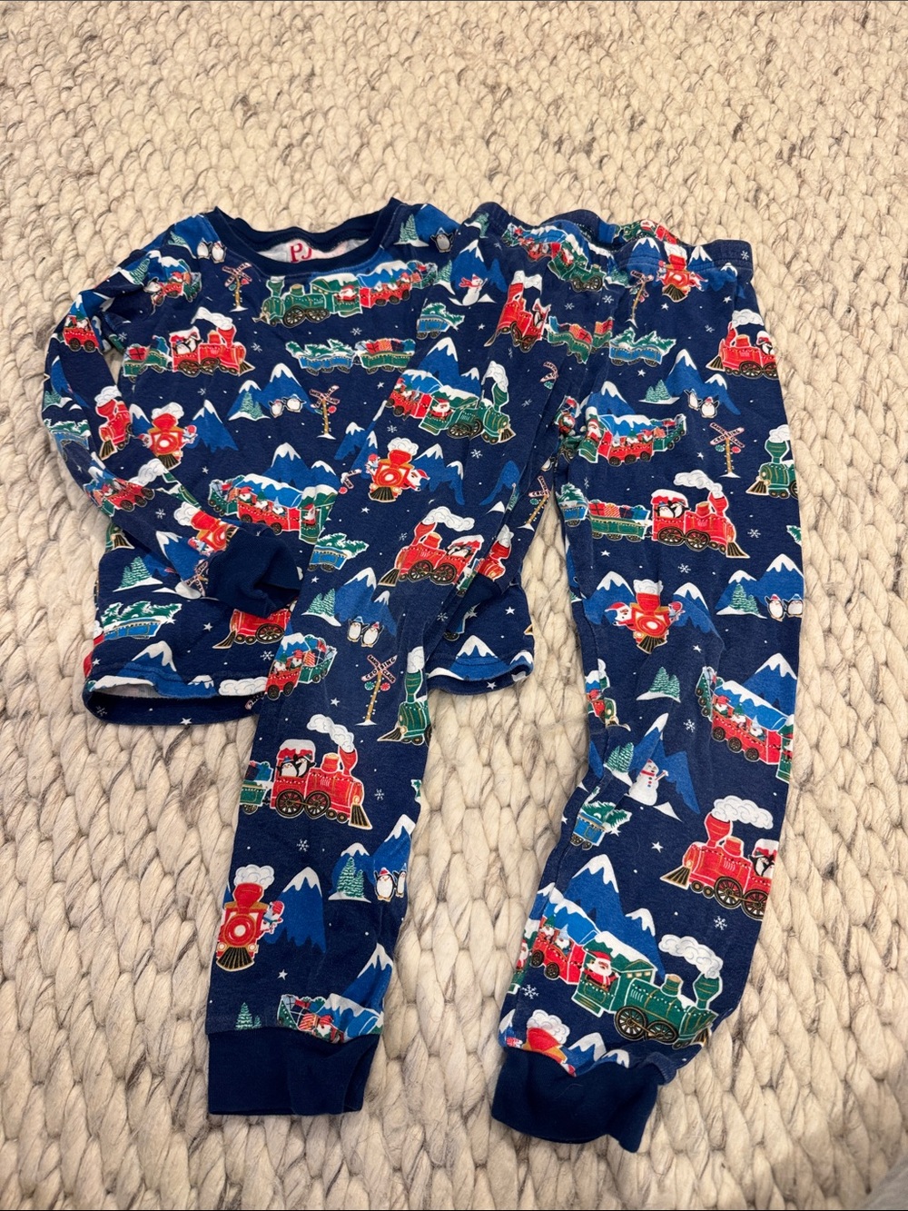 The Children's Place Navy Train Holiday Pajama Set with Red & Green Accents